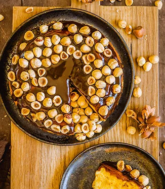 Pumpacheesecake med tranbär, kola och hasselnötter