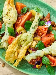 Zucchiniblommor med teriyakitomater