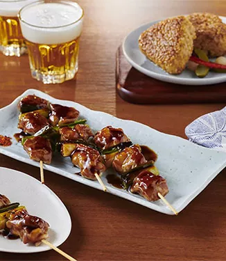 Kyckling och salladslök grillat på spett