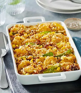 Pankogratinerad potatisgratäng med lök och grädde