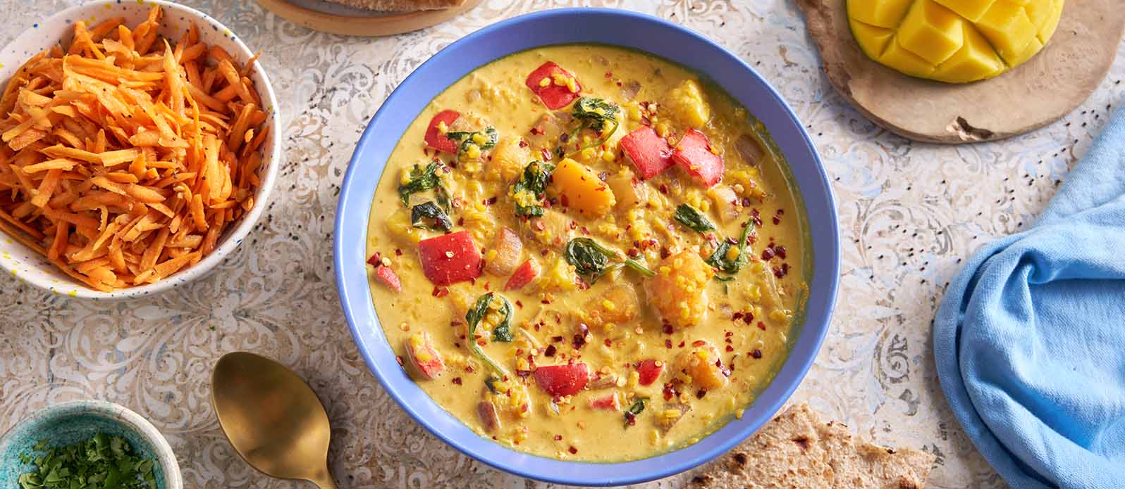 Moong dal med pumpa, mango och kokos